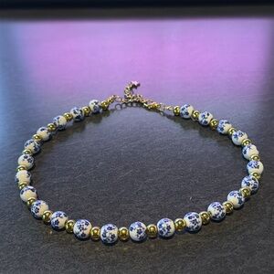 8mm flower blue and white bead | 6mm stainless steal gold beads | 15” necklace